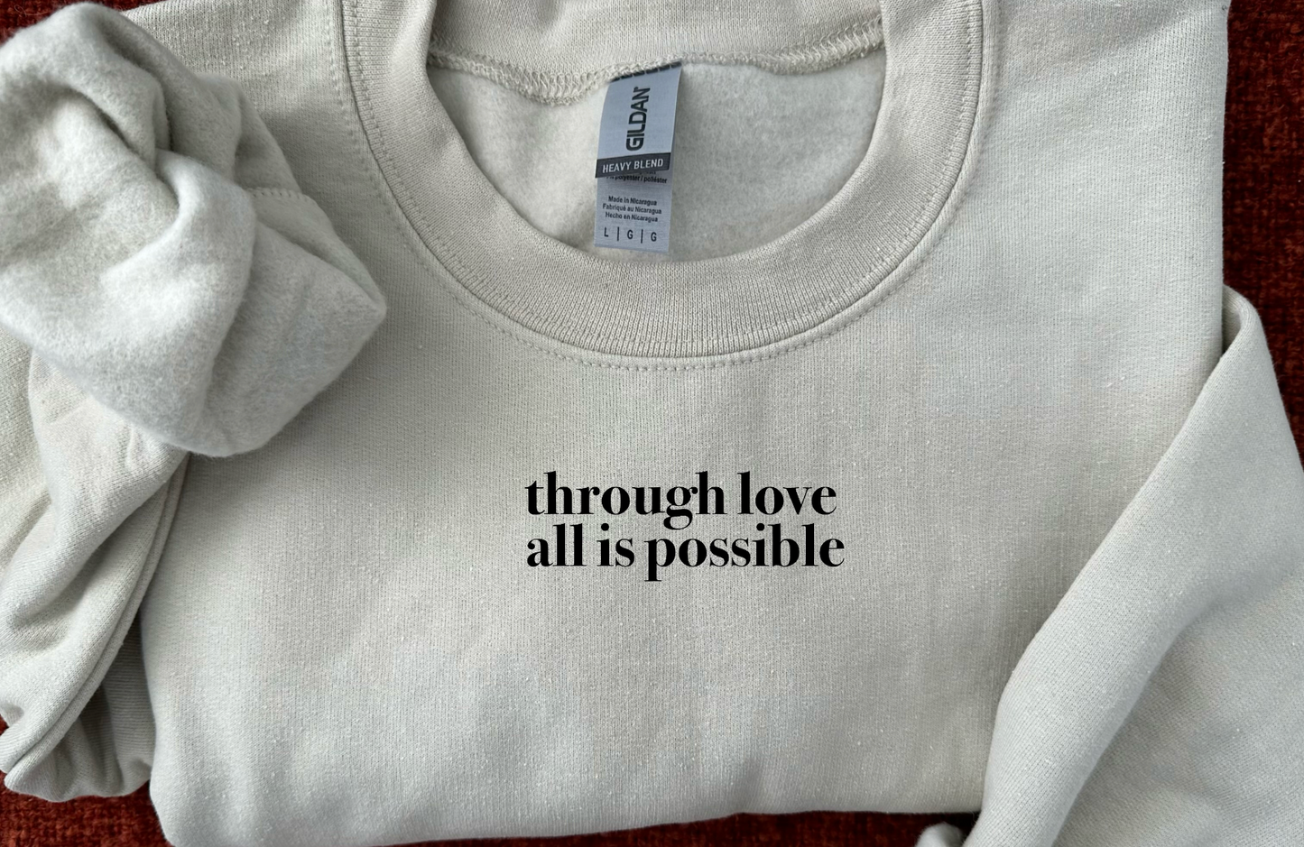 through love embroidered crewneck